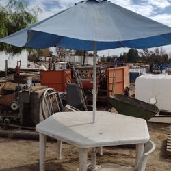 As Is Umbrella And Table . The Stand  Included.