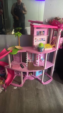 Giant Barbie house slide swing