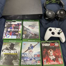Xbox one x with games 