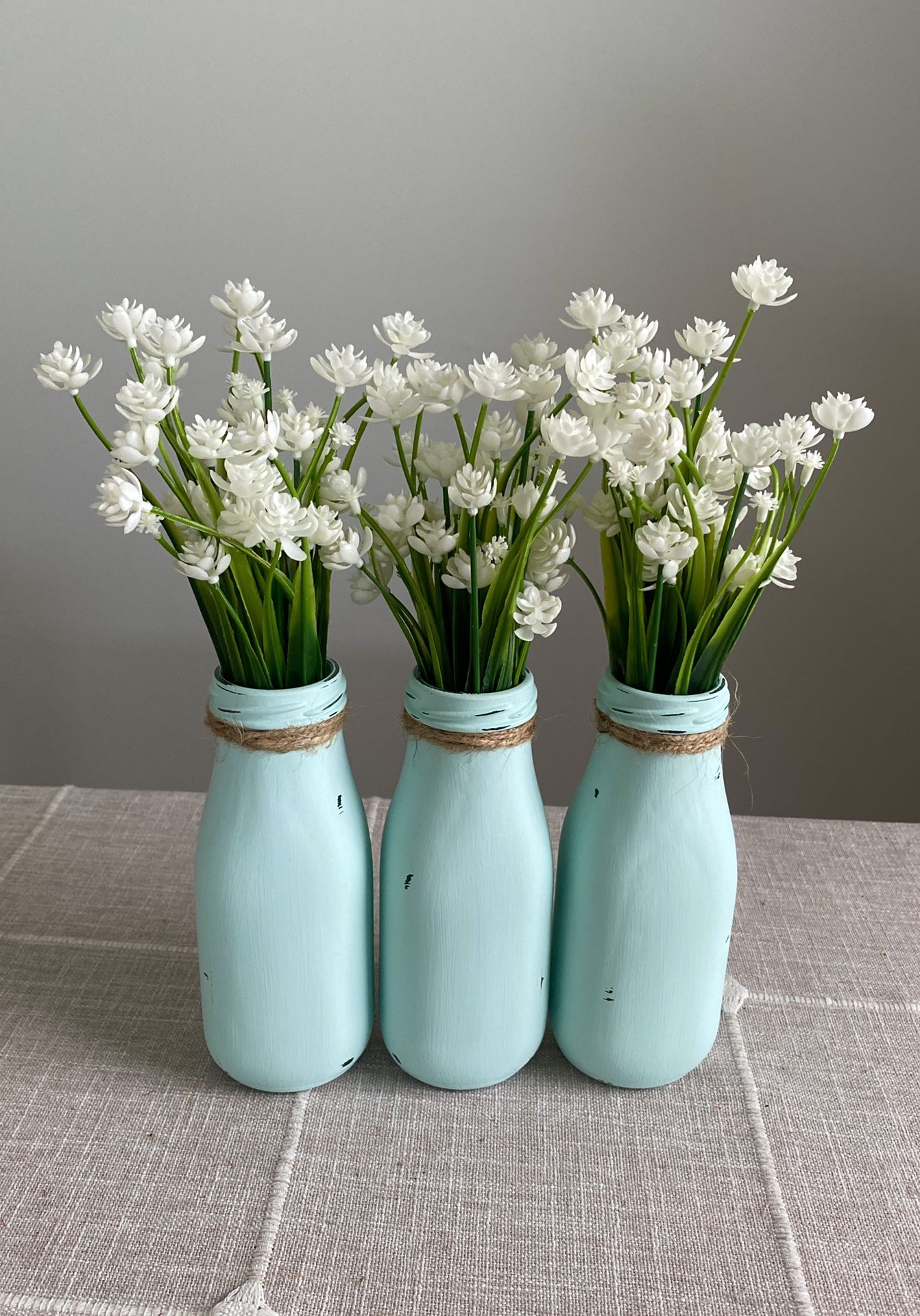 Chalk Painted & Distressed Milk Botttles W/faux Flowers Included