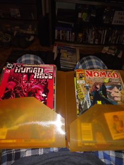 Several notebooks of DC and Marvel comics