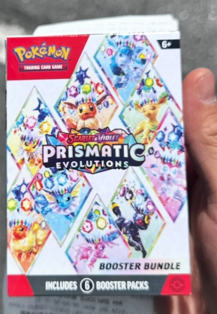 Prismatic evolutions Booster Pokemon Card