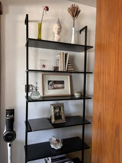 two wood/metal ladder bookcases