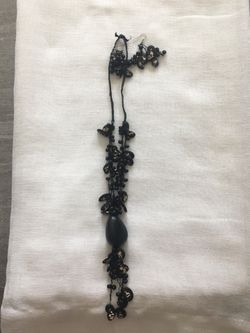 Hand made jewelry made in Colombia from fruit seeds