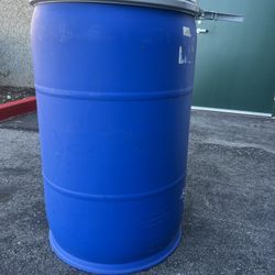 2 Blue 55 Gallon Plastic Barrel 