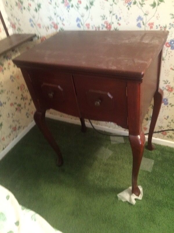 Antique sewing machine table