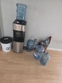 Water cooler dispenser with water jugs