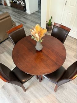 Round table with 4 chairs