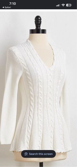 Cupio beige cable knit sweater dress features a V-neckline and a flared hem.