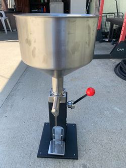 2 Kimtem Lip gloss filling machine (one is missing filler extension)