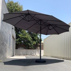$130 (New in box) Large 15ft double sided outdoor umbrella w/ 65 lbs plastic weight base (red/gray) 