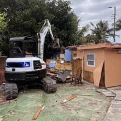 Excavator / Skid Steer