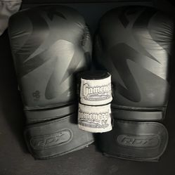 Black RDX Boxing Gloves with Gamenes hand wraps