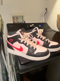 Nike pink and black air Jordans