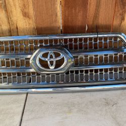Toyota Tacoma 2016-2019 Front Upper Center Chrome Grille Emblem 53114-04170 OEM