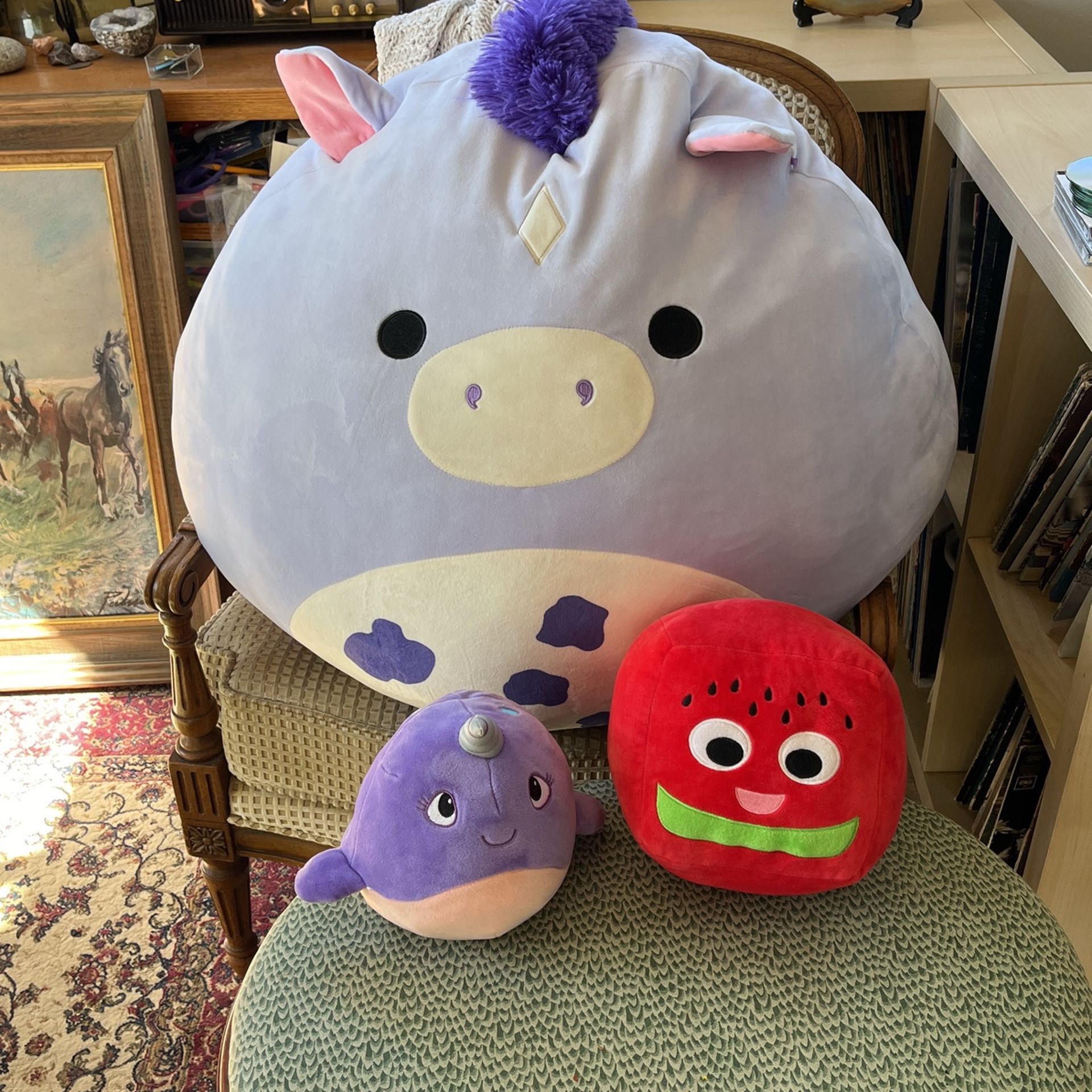 Stuffy Madness. One large, two small stuffed animals.