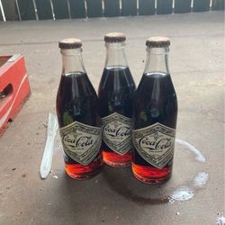 75th Anniversary Vintage Coca-Cola Bottles with crate