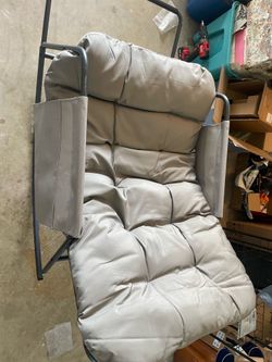 Rocking chair with side pockets
