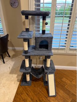 Like new cat tree, 63 inch tall
