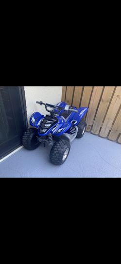 Boys Yamaha blue raptor