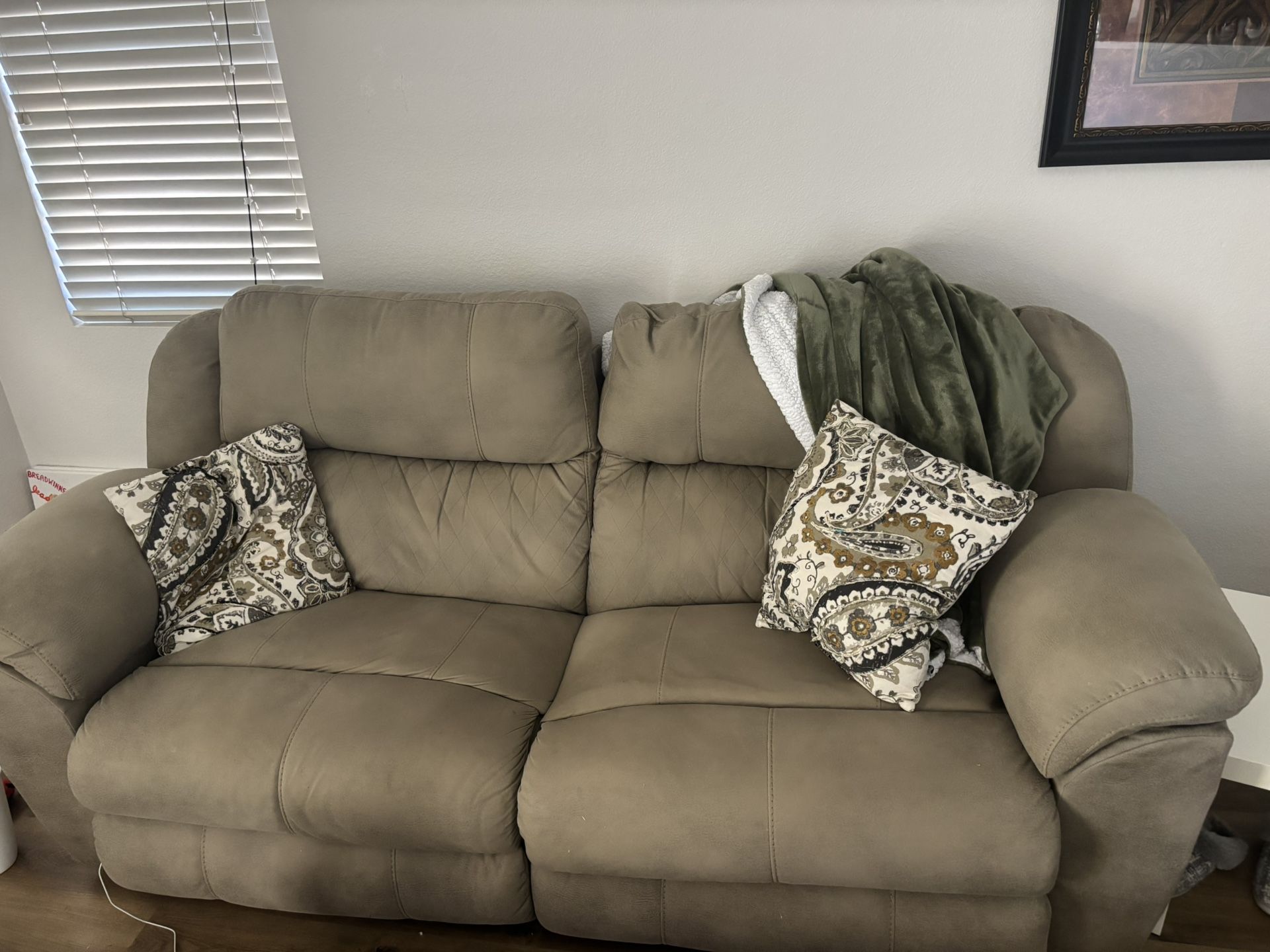 Reclining sofa with massager