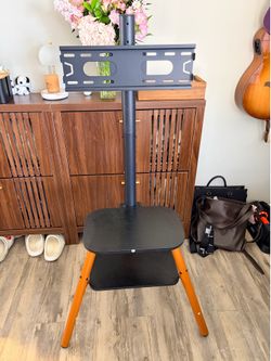 Brand New Tripod Stand for 35”-65” TV with shelf.