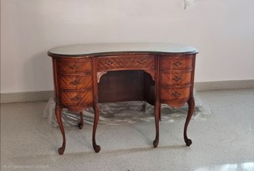 French Provincial-style writing desk with an elegant Louis XV design.