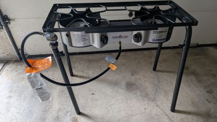 Camp Chef 2-burner stove with cylinder, almost new