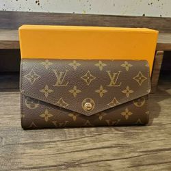 Louis Vuitton Brown Sarah Red Wallet for Sale in Queens, NY