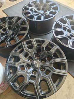 18" CHEVY RIMS OEM BLACK from factory semi new