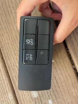 Genuine Mazda switch unit for Traction Control System (TCS) and other functions.