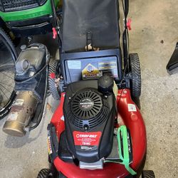 Troy-Bilt TB160 21 in. 160 cc Gas Walk Behind Push Mower with High Rear Wheels and 3-in-1 Cutting Triaction Cutting System