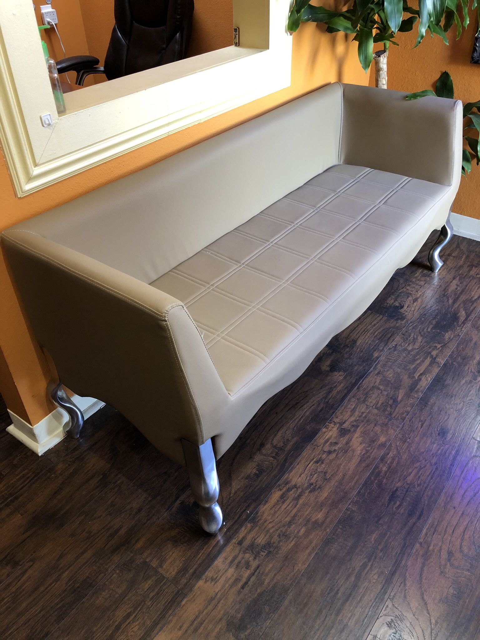 Custom-made green leather loveseat like new condition barely used Measurements. 64” L x 24” W x 29” H $295