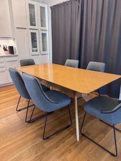 Wooden dinning table and 6 fabric chairs