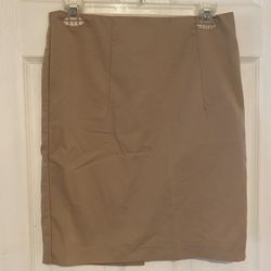 Size 2 tan pencil skirt with slit in back and back zipper 