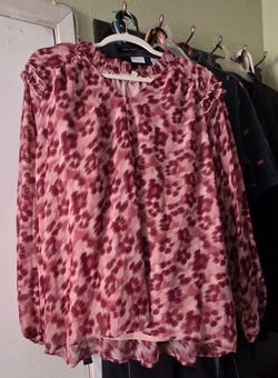 Women's leopard print blouse with ruffle embellishments on the arm long sleeve with a cuff at the end and a tie at the neck with a ruffle size XL