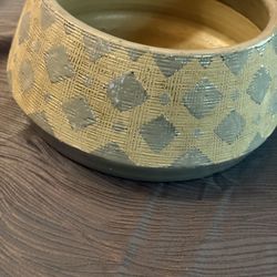 This is a Scandinavian-inspired ceramic bowl or planter with a hand-glazed geometric pattern. 