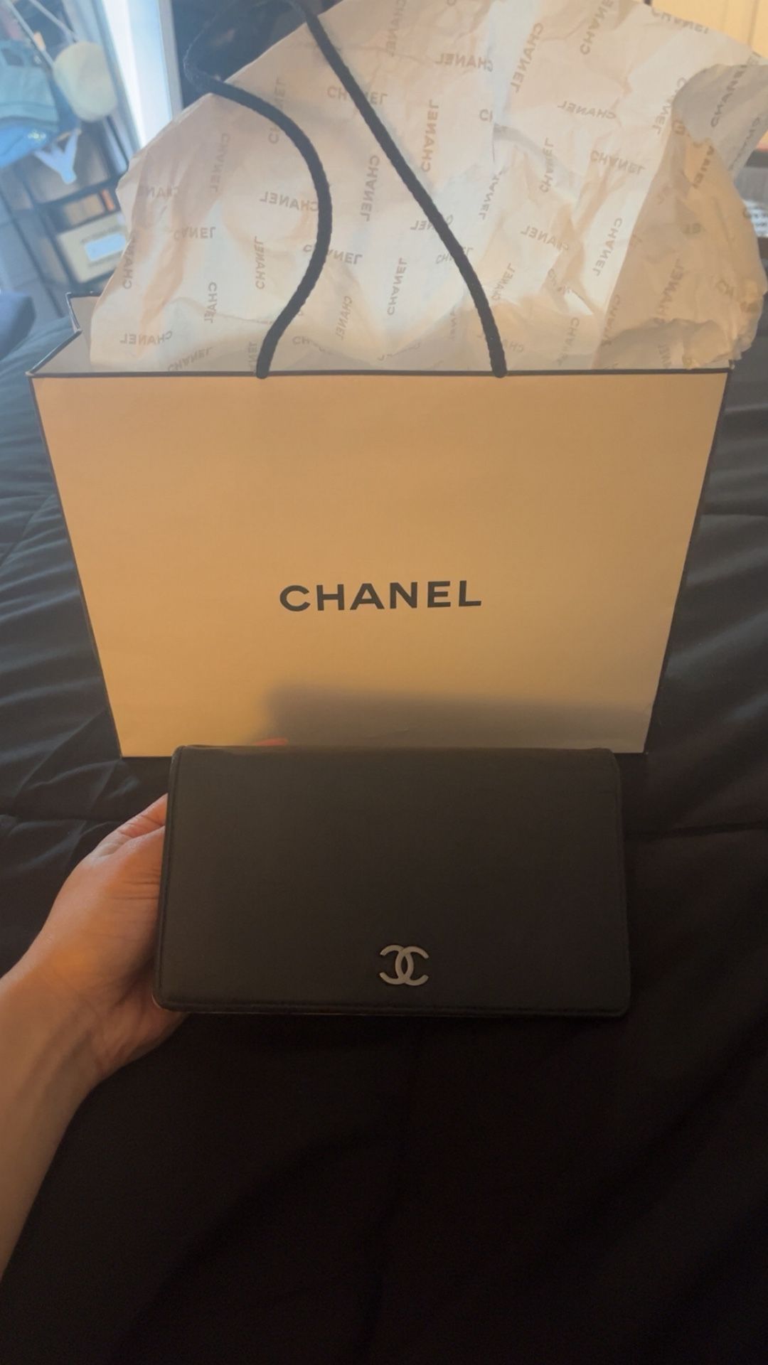 CHANEL Lambskin Camellia Embossed Yen Wallet