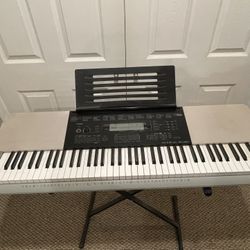 Casio Electric keyboard W/ Keyboard And Music Stands