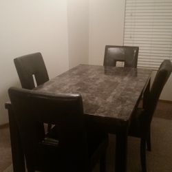 Dining Room Table And 4 Chairs