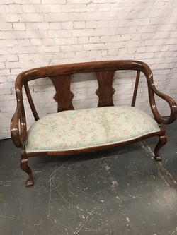Antique wooden loveseat outlet