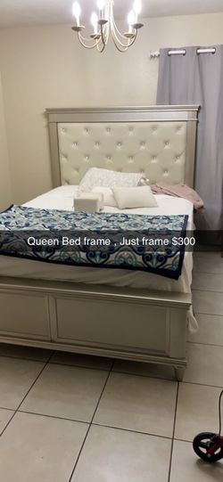 Queen bed frame with head board $300