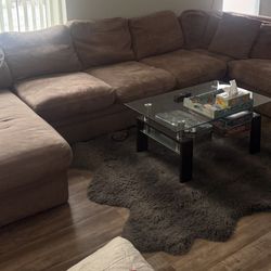 beige microfiber sectional sofa with a right-hand facing chaise lounge.