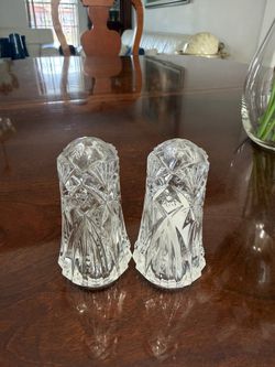 Vintage pressed cut glass salt and pepper shaker set.