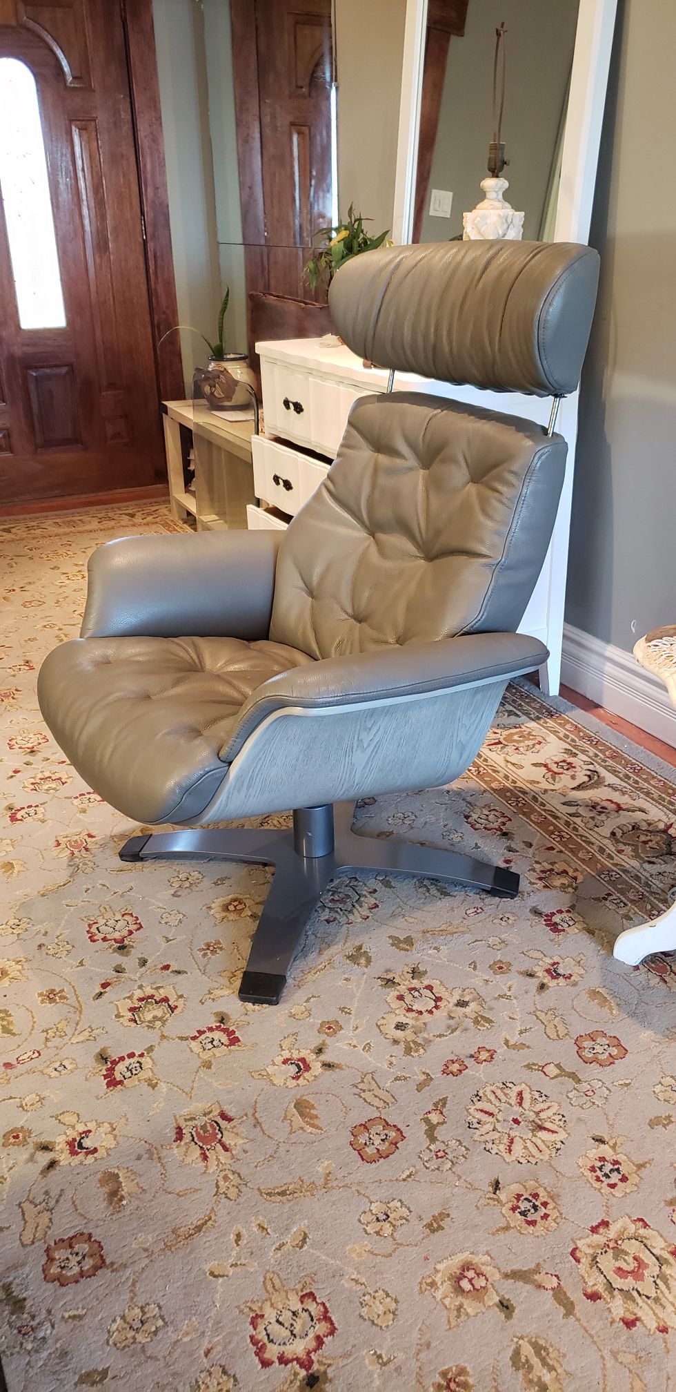 Italian leather chair, swivel and reclining, new