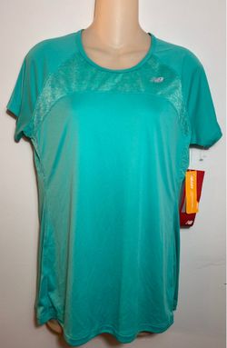 New women's T-shirt. Size L. $23.