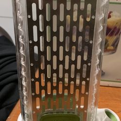 Prepara Herb Savor, a container designed to keep fresh herbs vibrant and hydrated. 