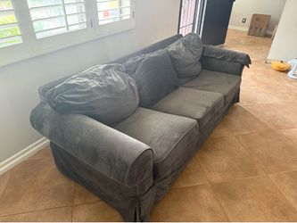 IKEA couch with gray slip covers