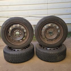 4- BRIDGESTONE TIRES 205/55/R16 WITH WHEELS 