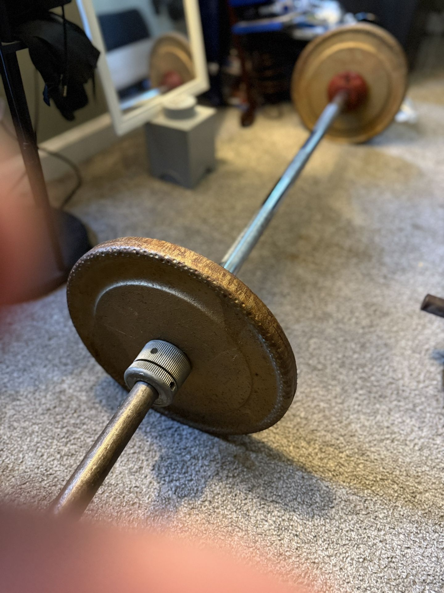 50lbs barbell + pair of 20lbs dumbbells